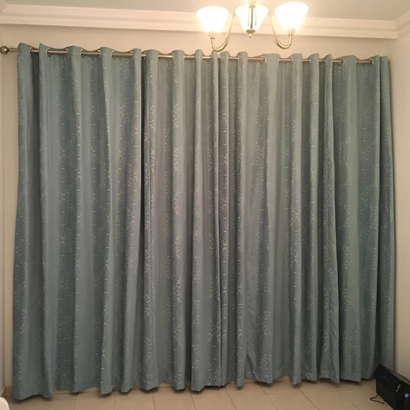 Eyelet Curtains with Rod — Rounded folds on a visible decorative rod.